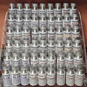 Array of labeled vials arranged neatly in rows.