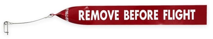Red "Remove Before Flight" tag with pin.