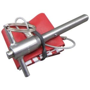 Metal tool with red folded fabric.