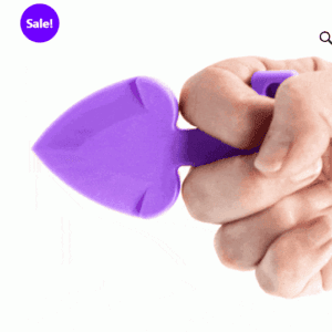 Hand holding a purple heart-shaped shovel.